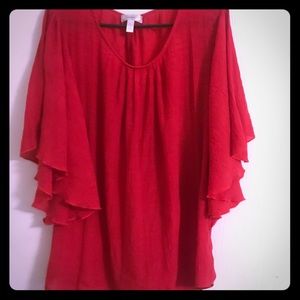 Red winged blouse